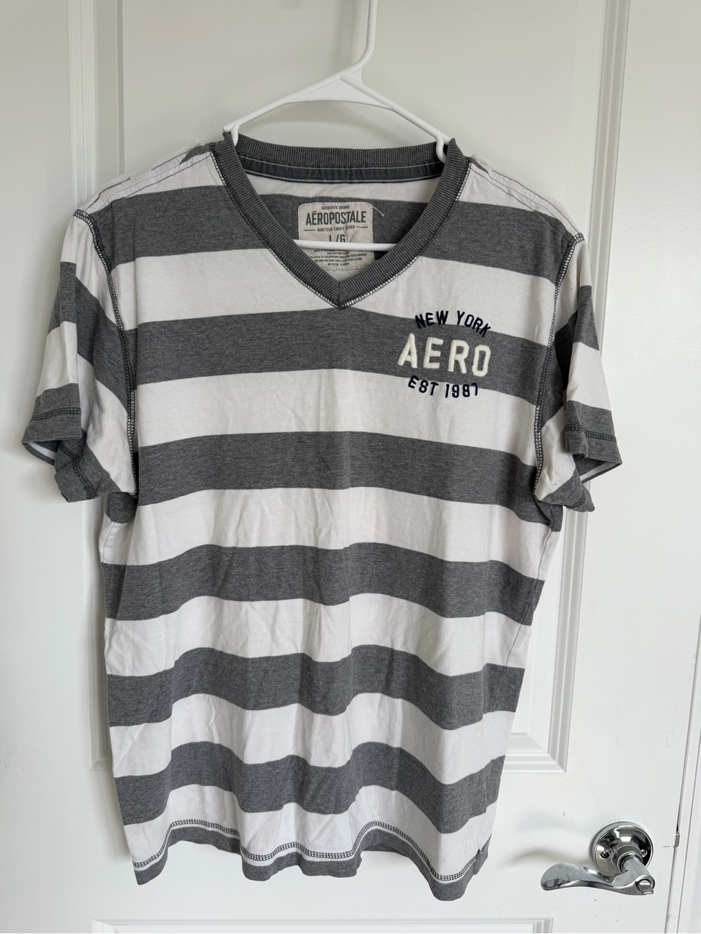 Aeropostale Men’s Gray & White Striped V-Neck Tee with AERO Chest Logo
